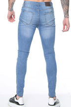 Signature Ripped Skinny Jeans – Medium Wash